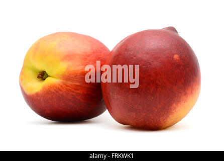 Two fresh peaches isolated on white background Stock Photo