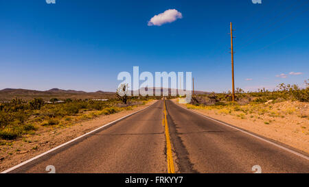 Long and empty lonesome road through Arizona Stock Photo