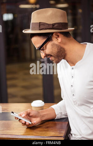Man using his smartphone Stock Photo