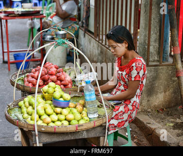 Fruit vendor at the Thiri Mingala Market in Yangon, Myanmar Stock Photo