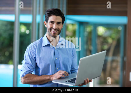 Smart man using laptop Stock Photo