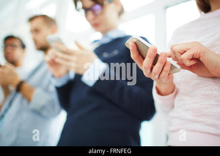 Using cellphones Stock Photo