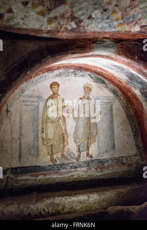 Naples. Italy. 6th C fresco of San Gennaro (St Januarius) (left) & San Pietro (St Peter) in the Catacombs of San Gennaro. Stock Photo