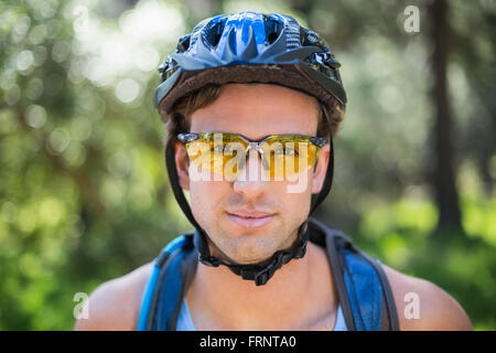 Close-up portrait of young man wearing sunglasses Stock Photo