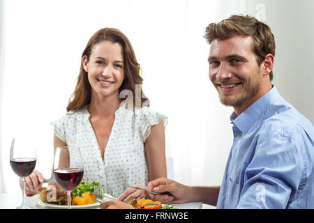Portrait of happy couple having lunch Stock Photo
