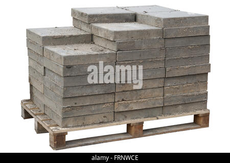 The old concrete paving blocks  are accurately put on wooden  pallet. Isolated. After repair of the sewerage the tile will be pu Stock Photo