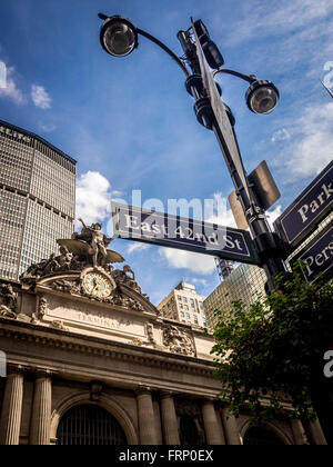 East 42nd St sign on lampost outside Grand Central Terminal train station, New York City, USA. Stock Photo