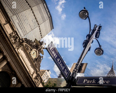 East 42nd St sign on lampost outside Grand Central Terminal train station, New York City, USA. Stock Photo