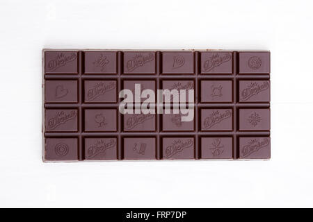 Divine chocolate bar on a white background. Stock Photo