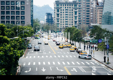 View of traffic on Songzhi Road, in the Xinyi District, Taipei, Taiwan. Stock Photo