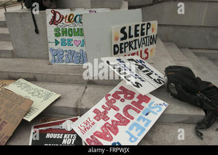 Denver, Colorado, USA. 21st Mar, 2016. Signs created by homeless rights activists sit on the steps of the Denver City and County Building. On March 21, 2016, members of the collective Denver Homeless Out Loud and residents experiencing homelessness gathered on the steps of the City and County building to denounce the recent ''sweeping'' of homeless camps from city streets. Since March 8, city employees have removed the belongings of homeless individuals from sidewalks where they had set up camp in Denver's Ballpark neighborhood, adjacent to area shelters. (Credit Image: © Graham Charles Hu Stock Photo