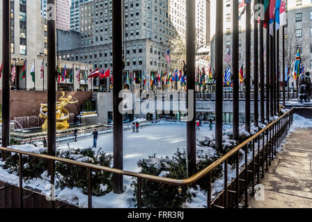 Ice Skating at The Concourse - part of the Rockefeller Center, New York City, USA. Stock Photo