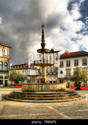 Main square Largo de Camoes with the fountain in Ponte de Lima Stock Photo