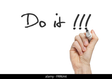 Phrase Do it on whiteboard written by hand Stock Photo