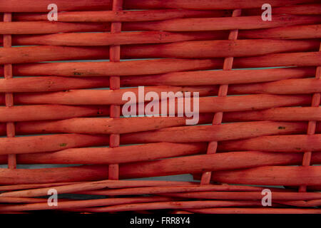 Woven basket texture in faded red Stock Photo
