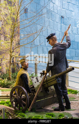 Minsk, Belarus - December 20, 2015: Soviet Belarusian partisans with cannon In The Belarusian Museum Of The Great Patriotic War Stock Photo