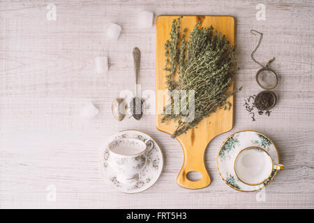 Tea preparation set with herbs top view Stock Photo