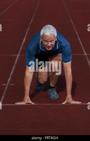 male runner on the tracks Stock Photo
