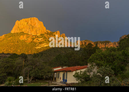 Sunset golden light on Casa Grande Mountain in the Chisos Mountains in Big Bend National Park. Stock Photo