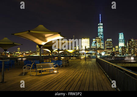 View of Lower Manhattan skyline at night from Exchange Place in Jersey City, New Jersey Stock Photo