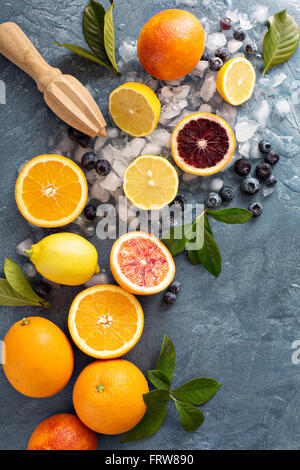 Making citrus smoothies and drinks Stock Photo