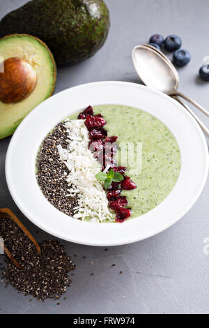 Green smoothie bowl with avocado and chia seeds Stock Photo