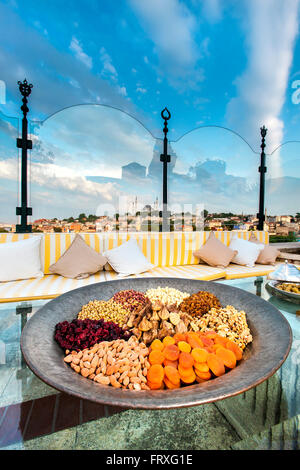 Nuts and dried fruit appetizer, rooftop restaurant with view over the city, Istanbul, Turkey Stock Photo