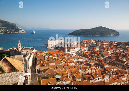 View from the Minceta Tower on the city wall across the old town rooftops with cruise ship MV Silver Spirit in the distance, Dubrovnik, Dubrovnik-Neretva, Croatia Stock Photo