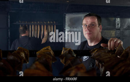 Smokehouse Thurow with owner Joachim Thurow, oldest smokehouse in Vorpommern, Freest, Mecklenburg-Vorpommern, Germany Stock Photo