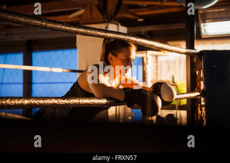 Female boxer taking a rest Stock Photo - Alamy