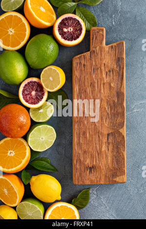 Citrus fruits background with oranges, limes and lemons Stock Photo