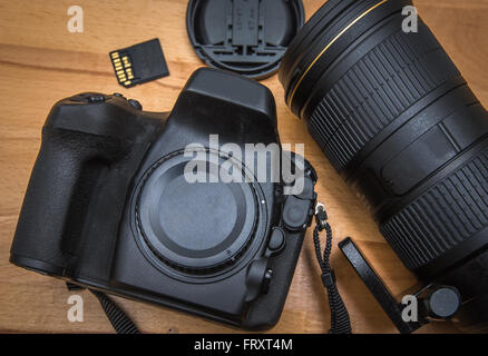 Close up  modern DSLR camera and devices Stock Photo