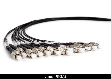 group of fiber optic ST connectors on black cable patchcord Stock Photo