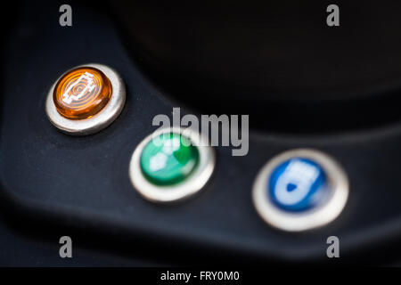 Check engine symbol on a motorcycle dashboard. Stock Photo