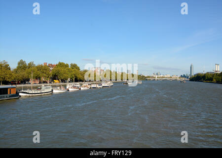 View up the River Thames towards Chelsea and Battersea from Albert Bridge, London, England Stock Photo