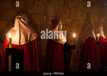 Santander, Spain. 23rd March, 2016.  Part of the procession of Holy Wednesday night runs in the cloister of the Cathedral of Santander  Credit:  JOAQUIN GOMEZ SASTRE/Alamy Live News Stock Photo