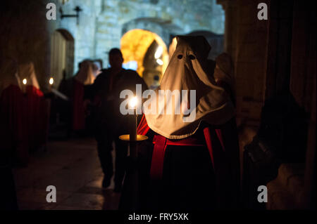 Santander, Spain. 23rd March, 2016.  Nazarenes of the Brotherhood of the Holy funeral procession made the mercy within the cloister of the Cathedral of Santander  Credit:  JOAQUIN GOMEZ SASTRE/Alamy Live News Stock Photo