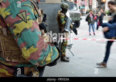 Brussels, Belgium. 24th March, 2016. Soldiers protect entry to metro station de Brouckere during day of National Mourning on March 24, 2016 in Brussels, Belgiu Credit:  Skyfish/Alamy Live News Stock Photo