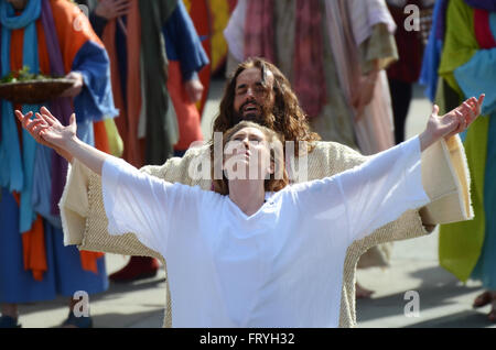 Easter Good Friday the cast of Wintershall portrayed the ‘Passion’ and the resurrection of Jesus Christ using Trafalgar Square as a stage. London. cleansing a leper Stock Photo