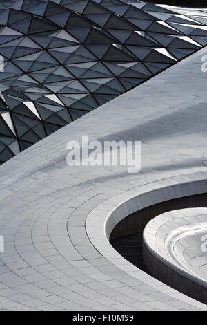 Curvaceous exterior facade with glazing and cladding. Harbin Opera House, Harbin, China. Architect: MAD Architects, 2015. Stock Photo