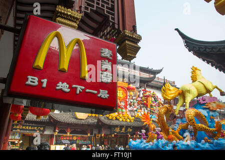 McDonald's sign and Chinese New Year decorations in the old town, Nanshi, Shanghai, China Stock Photo