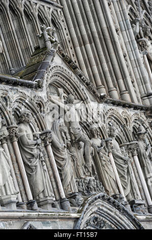 Crucifixion group: Mary, Jesus and John statue on Nidaros Cathedral West Front. Trondheim. Norway. Europe Stock Photo