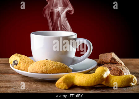 coffee cup with venetian biscuit on wood Stock Photo