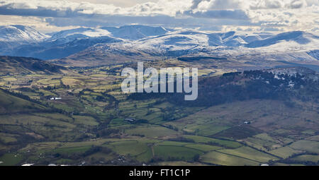 An aerial view of the Lake District uplands with snow capped mountains, North West England, UK Stock Photo