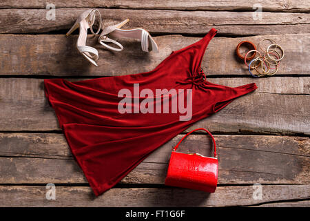 Red keyhole dress and accessories. Stock Photo