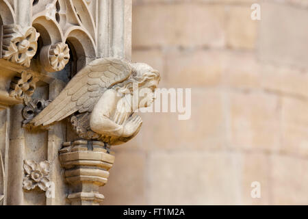 Stone carved Pulpit angel in Tewkesbury Abbey. Tewkesbury, Gloucestershire, England Stock Photo