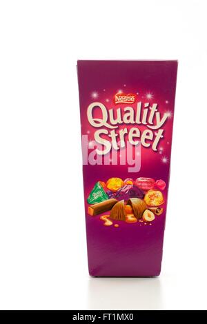 Box of Nestle Quality Street chocolates on a white background. Stock Photo