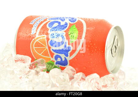 Fanta drink in can on ice isolated on white background Stock Photo