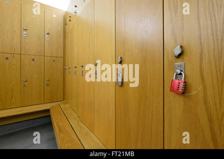 Empty school locker room with wooden benches and gray lockers 3D Stock ...