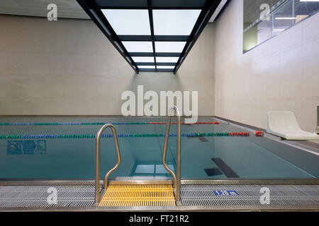 Indoor swimming pool entry ladder Stock Photo